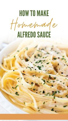 a white bowl filled with alfredo sauce and topped with parsley