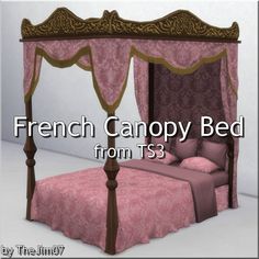 the canopy bed is made up in pink and gold