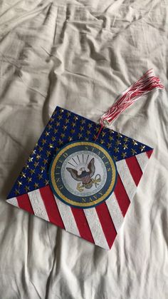 an american flag kite laying on top of a bed