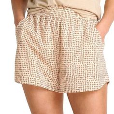 Whether you're playing in the surf of just a spirited game of flip cup, these shorts are down with getting a little (or a lot) wet. This summer staple boasts a relaxed fit, smocked waistband and secure zip pocket. Casual Loungewear Shorts For Warm Weather, Relaxed Fit Pajama Shorts With Short Inseam For Summer, Beachy Cotton Shorts For Warm Weather, Relaxed Pajama Shorts For Day Out, Beachy Bottoms With Relaxed Fit And Short Length, Relaxed Fit Beachy Shorts, Beachy Relaxed Fit Pajama Shorts, Casual Pajama Shorts For The Beach, Beachy Relaxed Fit Short Bottoms