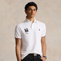 This Custom Slim Fit Polo shirt commemorates the Summer Olympic and Paralympic Games returning to the US in 2028. It’s embroidered with the Paralympic Agitos and an “LA28” graphic inspired by the iconic Ralph Lauren P-Wing symbol from the ’90s marking the first time in Olympic and Paralympic history where the Games emblem is reimagined by Ralph Lauren. Sweatpants And Sweater, Paralympic Games, Slim Fit Polo Shirts, Slim Fit Polo, Polo Bear, Polo Shirt White, The Games, Summer Olympics, Ralph Lauren Home