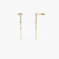 Unveil elegance with our Gold Linear Bar Triple Diamond Drop Earrings, featuring 14K gold bars adorned with a total of 0.28 carats of diamonds. These chic dangle earrings make a perfect gift for her, seamlessly merging classic sophistication with modern flair. Elevate your ensemble with these stunning earrings, epitomizing the timeless allure and contemporary style. ▶ Details   * Made to Order * Gold KT: 14K Solid Gold (also available in 18K & Platinum upon request) * Custom Gold Color: Rose Gol Luxury Linear Earrings For Formal Events, Luxury Classic Linear Earrings In Diamond White, Luxury Elegant Diamond Linear Earrings, Luxury Modern Linear Earrings For Wedding, Luxury Yellow Gold Linear Earrings With Brilliant Cut, Luxury Fine Jewelry Diamond Cut Linear Earrings, Luxury Fine Jewelry Linear Earrings With Diamond Cut, Yellow Gold Linear Drop Earrings With Brilliant Cut, Spoon Necklace