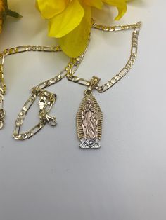 GOLD PLATED Tarnish free/won't turn your skin green with proper care Pendants and Chains are gold plated 5 times for a long lasting durable shine Oval Yellow Gold Jewelry With Our Lady Of Guadalupe, Necklaces Guadalupe, Guadalupe Necklace, 14k Gold Our Lady Of Guadalupe Necklace, Gold Our Lady Of Guadalupe Round Pendant Necklace, Gold Our Lady Of Guadalupe Pendant Necklace, St Jude, Green Collection, Cross Jewelry