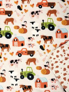 the fabric has farm animals on it