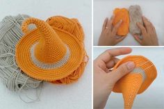 crocheted orange and gray items displayed on white surface with hand holding yarn ball