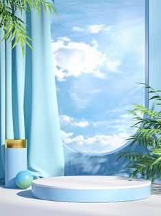 there is a round table in front of a window with blue curtains and a potted plant