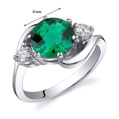 An ode to Mother Nature This Emerald ring is an enchantingly easy-to-wear shade of green, blurring the lines between reality and dreams. This versatile ring features a round shape Peora simulated Emerald gemstone in .925 sterling silver. Technically crafted and cut for optimum brilliance, our simulated Emerald gemstones are optically identical to their mined counterparts, but they are made using alternative materials. We're big fans of eco-luxury. Handcrafted in pure .925 sterling silver goodnes Mothers Ring, Blue Topaz Bracelet, Green Opal, Round Stud Earrings, Silver Prices, Pretty Earrings, Emerald Gemstone, Sterling Silver Earrings Studs, Emerald Ring