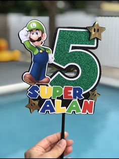 "▪️These super cool Mario and Luigi cake toppers will be the perfect touch to your little ones theme party! ▪️It is made with high quality Cardstock paper and quality printed images. ▪️Cake topper has very cute details and 3D looking effect ▪️Cake topper measures 7x7.5\" approx(not measuring stick) ▪️Cake topper is one sided ▪️The color of the stick may vary depending of availability but it will always match with the topper ▪️Please send me a message if you would like to add anything on the desi Luigi Cake Birthdays, Luigi Birthday Cake, Mario Centerpieces, Mario And Luigi Cake, Mario Brothers Cake, Super Mario Cake Topper, Luigi Cake, Mario Cake Topper, Mario Bros Birthday Party Ideas