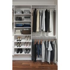 an organized closet with clothes and shoes