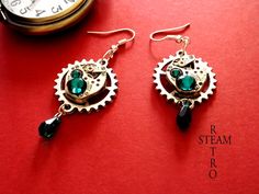 Handmade steampunk earrings featuring a pair of vintage 17 jewel mechanical watch movements with exposed gears, these upcycled earrings also feature Emerald Swarovski elements, delightful treasures sure to please any lady with discerning taste. When you buy from Steamretro you will receive a fantastic Handmade piece of jewelry, quite distinct from any other boutique! We offer FREE shipping on the second any any subsequent items when you shop with us All you need to do is add the item to your Sho Silver Steampunk Earrings, Gold Steampunk Earrings, Steampunk Metal Earrings For Gift, Steampunk Nickel-free Brass Earrings, Nickel Free Brass Steampunk Earrings, Steampunk Nickel-free Earrings As Gift, Steampunk Brass Nickel-free Earrings, Steampunk Nickel-free Earrings For Gift, Steampunk Style Earrings As Gift