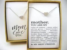 Mothers Day Gift, Tiny Heart Necklace, Mothers Necklace available in Gold or Silver, Gift for Mom This pretty necklace features a dainty silver or gold heart. Necklace can be worm casually with a tee or as a sophisticated necklace for more formal occasions. Choose your choice of note/message during checkout. The silver or gold plated chain comes suspended from a dainty chain. Choose length during checkout. NEW PACKAGING: All pieces come in a black Devin Michaels gift box ready for gifting! Thank Sunshine Heart, Grandmother Necklace, Tiny Heart Necklace, Mother Daughter Jewelry, Mother Necklace, Bottle Charms, Witchy Jewelry, Bird Pendant, Mothers Necklace