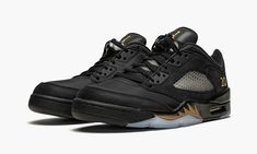 The Air Jordan 5 Low “Class of 2021” is a special makeup of Michael Jordan’s fifth signature shoe that celebrates the 2021 graduating class of Jordan Brand’s Wings Scholarship Program.  Intentionally minimal in design, the “Class of 2021” mimics a cap-and-gown outfit with a predominantly black color scheme.  The upper is dressed in all black with a nylon textile base at the toe and heel and nubuck overlays through the midfoot.  The gold embroidered “20” and “21” logos found on the lateral sides Air Jordan 5 Retro Low, Gown Outfit, Nike Air Jordan 5, Special Makeup, Perfect Sneakers, Jordan Model, Jordan 5 Retro, Air Jordan 5 Retro, Air Jordan 5