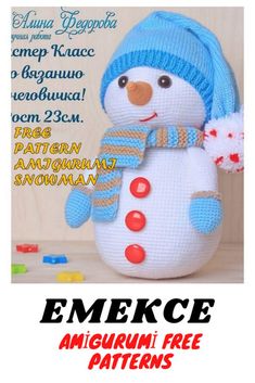 a crocheted snowman with a blue hat and scarf