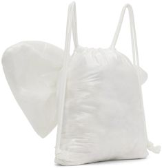 Padded transparent vinyl backpack in white. · Bow appliqué at face · Drawstring closure and shoulder straps · Fully lined · H8 x W13.5 x D4 in Available exclusively at SSENSE. Supplier color: Gray White Plastic School Bags, White School Bag With Clear Strap, White Nylon Standard Backpack, Men's Bags, Travel Collection, White Bow, Personal Shopping, Bags Backpacks, Travel Luggage