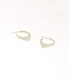 This pair of hoops are made from sterling silver and they come with butterfly ear backs. They are 20 mm long and 15 mm wide. If your ears can handle a bigger gauge I can make this pair a sleeper one without the need to have an ear back. If you prefer it smaller, have a look here: https://www.etsy.com/listing/628994062/small-hoops-sterling-silver-geometric?ref=shop_home_active_9&crt=1 Each pair is handmade to order and may slightly vary from the pictures. Please allow for subtle variations ma Small Hoop Sterling Silver Cartilage Earrings Tarnish Resistant, Tarnish Resistant Small Hoop Sterling Silver Cartilage Earrings, Tarnish Resistant Sterling Silver Small Hoop Cartilage Earrings, Minimalist Polished Sterling Silver Huggie Earrings, Modern Small Hoop Cartilage Earrings Tarnish Resistant, Silver Teardrop Minimalist Huggie Earrings, Minimalist Sterling Silver Tarnish-resistant Hoop Earrings, Modern Sterling Silver Teardrop Huggie Earrings, Modern Teardrop Sterling Silver Huggie Earrings