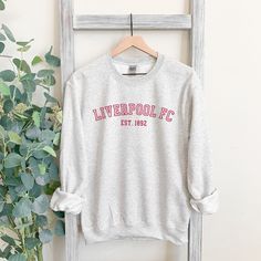 Liverpool FC Crewneck Vintage-inspired Liverpool Soccer Sweatshirt Liverpool FC EST. 1892 Classic Crewneck - Etsy Collegiate Sweatshirt With Logo For Fans, Collegiate Sweatshirt With Team Logo For Fans, Fan Apparel Sweatshirt With Logo Print, Fan Merchandise Sweatshirt With Logo Print, Fan Merchandise Logo Print Sweatshirt, Sports Season Fan Merchandise Sweatshirt With Logo Print, Team Logo Sweatshirt For Fan Merchandise, Soccer Sweatshirt, Football Passion