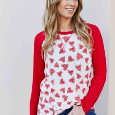 Simple, Yet Stylish, This Raglan Sleeve Top Will Be Your Go-To Top For Every Casual Occasion. The Style Features A Round Neck And Long Sleeves That Can Be Worn Alone Or Layered With Your Favorite Cardigan. Color: Ivory/Red Pattern Type: Heart Style: Girl Next Door Features: Basic Style Neckline: Round Neck Length: Regular Sleeve Length: Long Sleeves Sleeve Type: Baseball Sleeves Material: 95% Polyester, 5% Spandex Stretch: Highly Stretchy Sheer: No Body: Not Lined Care Instructions: Machine Wash Red Tops With Heart Graphic For Spring, Red Heart Graphic Top For Spring, Cute Red Tops For Valentine's Day, Red Heart Print Casual Top, Casual Red Heart Print Top, Casual Red Top With Heart Print, Trendy Red Top With Heart Print, Casual Red Tops For Valentine's Day, Cute Red Heart-shaped Top