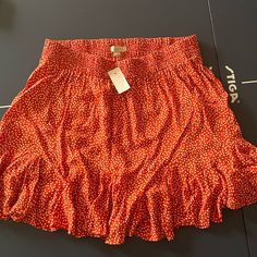 Loft, Medium, Burnt Orange With White Polkadot Skirt And Ruffled Hem. Never Worn. Great Condition. Polka Dot Bottoms For Vacation In Spring, Summer Polka Dot Mini Bottoms, Summer Polka Dot Skirt With Elastic Waistband, Trendy Polka Dot Summer Skirt, Trendy Polka Dot Skirt For Summer, Summer Polka Dot Flowy Skirt, Casual Polka Dot Skirt With Elastic Waistband, Casual Polka Dot Mini Bottoms, Casual Polka Dot Tiered Skirt