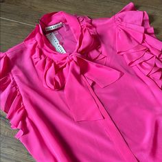 Gorgeous (Nwt) Alice + Olivia Fuchsia Short Sleeve, Bow, Ruffled Sleeve Blouse! Lightweight, Button Down, Made Of 100% Silk. Size Xl Bust (Laying Flat/Pit To Pit)-19 Inches Length (Laying Flat)-25 Inches Retails For $285 Bundle & Save $$ Price Is Firm Not Accepting Offers Thank You For Looking! No Trades Please. Packages Ship Daily Mon.-Fri., Sometimes On Saturdays. Please Be Patient As My Post Office Is Sometimes Slow Pleated Sleeves Blouse, Olivia Pink, Black Silk Blouse, Ruffle Linen, Striped Linen Shirt, Lace Blouse Long Sleeve, Puff Sleeve Crop Top, Ruffle Sleeve Blouse, Black And White Blouse