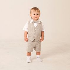 "Baby boy natural linen suit includes SET of 4 : - Shorts  - Vest  - Shirt  - Bow tie The vest is fully lined with cotton. Shorts come in elastic waist adjustable with buttons. The bow tie is pre-tied with adjustable Velcro closure on the back. You can order the appropriate size for your baby. Please see the size chart in the last image. It would be good if you could send the individual measurements - full height, waist and hip circumference. I will make this outfit exactly for your child accord Baby Boy Formal Wear, Baby Boy Linen, Boys Formal Wear, Baby Boy Vest, Bearer Outfit, Boys Vest, Baby Boy Dress