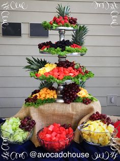 an assortment of fruits and vegetables displayed on a table with the words avocadohouse above it