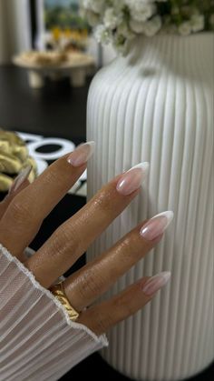 Indulge in timeless elegance with our collection of short, oval-shaped almond nails. From chic nude hues to classic French tips, these classy and elegant nail designs capture the essence of old money sophistication. Elevate your manicure game with understated glamour! #OldMoneyNails #ClassyNails #NailIdeas Bride French Tip Nails Wedding, French Tip Acrylic Nails Almond Chrome, French Mani Acrylic, Bride Pedicure Ideas, French Tip Bride Nails, Classy Almond Shaped Nails, French Ombre With White Chrome, Wedding Nails Inspo For Bride, Bride French Tip Nails