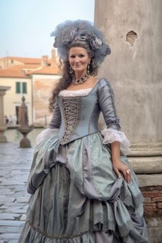 Immerse yourself in the splendor of Venetian haute couture with our exquisite Carnival and Masquerade Ball costume. This handcrafted masterpiece will transport you to the golden age of Venice, where elegance and mystery were intertwined in every celebration. Every detail of this suit has been meticulously crafted by Venetian artisans, paying homage to the rich heritage of the canal city. The richness of the fabrics, the precision of the embroidery and the attention to color reflect Venetian trad Baroque Victorian Dress For Costume And Medieval Festivals, Baroque Victorian Dress For Costume Parties And Medieval Festivals, Elegant Historical Costume For Costume Party, Elegant Fitted Masquerade Mask For Costume Party, Elegant Baroque Masquerade Mask For Costume, Baroque Masquerade Mask For Carnival Costume, Elegant Baroque Masquerade Mask For Theater, Pustni Kostumi, Masquerade Ball Costume