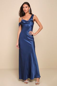 You'll be an irresistible vision of beauty when you slip into the Lulus Elevated Romance Navy Blue Satin Asymmetrical Maxi Slip Dress! Sleek stretch-woven satin shapes this elegant dress with adjustable spaghetti straps and a foldover, cowl-style neckline that continues into a single, draping off-the-shoulder strap (with pleated details) that lends an asymmetrical silhouette. The darted bodice continues into a figure-skimming slip skirt that ends at a sweeping maxi hem. Hidden back zipper/clasp. Blue Maxi Length Slip Dress For Evening, Blue V-neck Slip Dress For Formal Occasions, Formal Blue Midi-length Slip Dress, Blue Fitted Floor-length Slip Dress, Blue Bias Cut Floor-length Maxi Dress, Asymmetrical Maxi Dress, Blue Satin Dress, Maxi Slip Dress, Silk Slip Dress