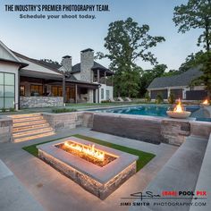 an outdoor fire pit in front of a house