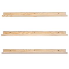 three unfinished wooden shelves on a white background