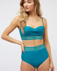 The Solid Two Piece Swimsuit is a classic and versatile swimwear option that combines timeless style with a comfortable fit. With its solid color design, it offers a minimalist yet sophisticated look for the beach or poolside. This two-piece swimsuit provides both ease of movement and a fashionable appearance, making it a dependable choice for enjoying the sun and water with confidence.Bottom's Measurements:Waist: 12.5"Length: 11.5"Model is wearing SmallHeight: 5'9"Bust : 32BWaist : 24"Hips : 34 Two Piece Swimsuit, Sun And Water, Enjoying The Sun, Black Swimsuit, Timeless Style, Timeless Fashion, Color Design, The Sun, The Beach