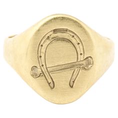 This is a lovable equestrian lover signet ring engraved with a horseshoe and a riding crop. It is a pinky ring , size 5 can be worn on the ring finger or but can be enlarged if wished. The engraving is crisp. The face measures 13.2mmx11mm. Wear it with other rings on the same hand be they silver or gold. So sweet. All one continuous piece of smooth gold Weight 5.8 grams Riding Crop, Pinky Ring, Ring Finger, Engraved Rings, Signet Ring, Equestrian, The Face, Jewelry Rings, Ring Size