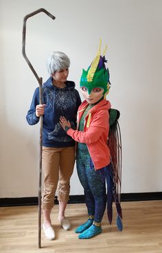 two women in costumes standing next to each other