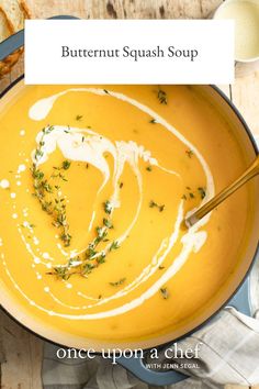 a bowl of butternut squash soup with a spoon in it and the title overlay reads, butternut squash soup once upon a chef