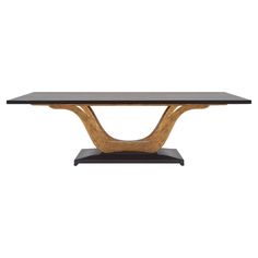 a wooden table with black glass top on a white background, it is isolated from the side