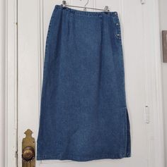 "Eddie Bauer jean maxi skirt. Button closure on side. This is a nice heavy cotton denim. This skirt is in great condition. Waist:  31\"  Hip: 46\" Length 37\"  13\" slit 7\" side closure with 3 buttons Marked size 14 Will it fit? Here is a helpful link for taking measurements http://thewishingwardrobe.blogspot.com/2010/07/answering-question-is-that-gonna-fit-me.html PLEASE READ: These products are vintage and some are handmade. Some are new and unused but can still have signs of age from storage. If you are particular or a perfectionist please do not order. It is assumed you have read the shop policies before ordering." Jean Maxi Skirt, A Line Maxi Skirt, Floral Palazzo Pants, Portland Me, Ankle Length Jeans, Vintage Usa, Brown Leather Jacket, Satin Slip, Denim Flares