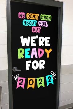 a door with the words we don't know about you but we're ready for 2012