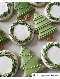 christmas cookies decorated with green and white icing