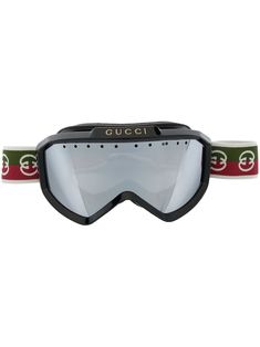 a pair of goggles with the word gucci on it and an eye patch