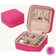 an open pink case with jewelry in it