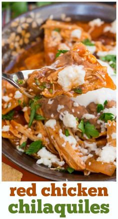 red chicken chili in a bowl with rice and garnish