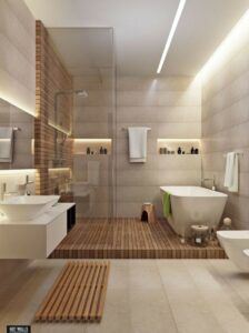 a bathroom with two sinks, a bathtub and a toilet