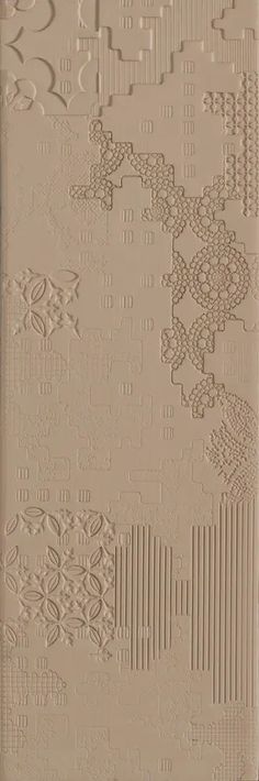 an intricately designed wallpaper in beige