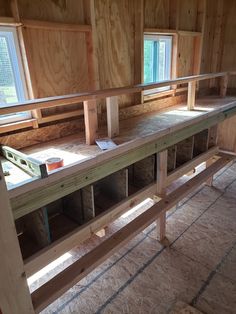 the inside of an unfinished house with wood framing