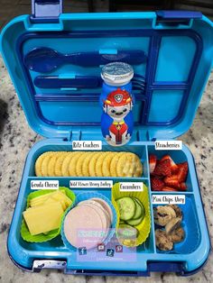 an open lunch box filled with lots of food