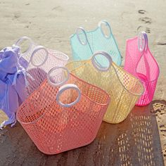 Modern retro basket. From the beach to the market, the Fiesta shopper is practical and stylish. 1 Bag Handles Clip Together Flat Base Dimensions: 18 W x 18 H x 9 D inches Low-Density Polyethylene 100% Recyclable, Washable and Reusable Cheap Pink Beach Bags, Cheap Pink Beach Shoulder Bag, Cheap Multicolor Beach Bag For Beach Season, Cheap Colorful Summer Bags, Cheap Colorful Beach Bag, Colorful Cheap Beach Bag For Vacation, Cheap Colorful Beach Bag For Vacation, Affordable Multicolor Beach Bag For Spring, Affordable Colorful Beach Bag For Daily Use