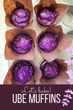 four purple muffins in paper cups with the words cat's baked ube muffins