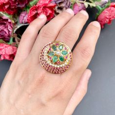 Featuring a ruby emerald and pearl ring in 22ct gold. The ring is adjustable and weighs 10.8 GMs Price Breakup Summary Component Rupees % of Total 22k Gold 51,216 75.1% Stones & Beads 5,808 8.5% Making Charges 9,219 13.5% Taxes (GST) 1,987 3.0% Total 68,230 100.0% View Detailed Price Breakup Watch Video Here Traditional Ruby Ring With Stone Setting, Temple Jewelry Style Ruby Wedding Ring, Traditional Hallmarked Ruby Ring, Traditional Green Hallmarked Rings, 22k Gold Ruby Ring For Anniversary, Traditional Yellow Gold Ruby Ring With Gemstone, Traditional Round Ruby Ring, Green Ruby Ring Jewelry, Gold Fusion Emerald Ring