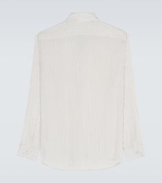 Featuring an Yves collar and straight shoulders, this silk shirt from Saint Laurent is printed all-over with thin grey stripes. | Saint Laurent Striped silk shirt Straight Shoulders, Stripe Silk, Silk Shirt, Grey Stripes, Casual Shirts, Saint Laurent, Long Sleeve Shirts, Stripes, Silk