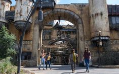 the entrance to star wars galaxy at disneyland world